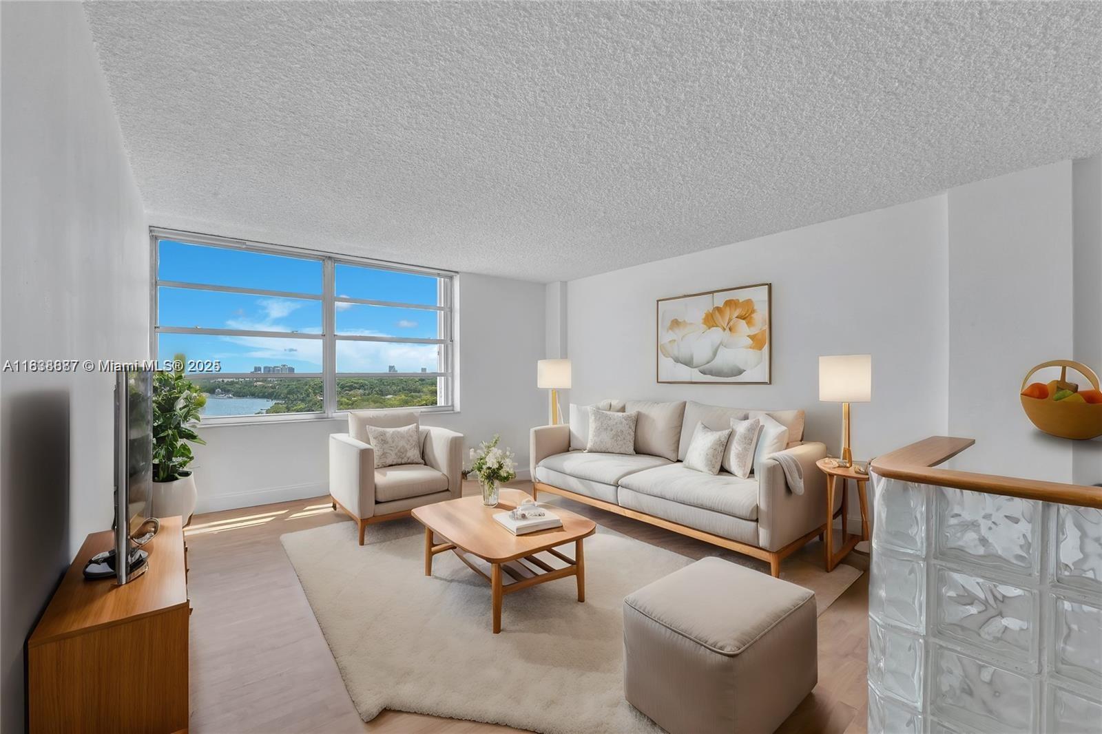 Enjoy stunning sunsets overlooking the bay and Vizcaya Park from this beautifully located penthouse unit. Open kitchen, a spacious master bedroom with en-suite bathroom, and a versatile den area ideal for a home office or reading nook. One assigned covered parking space. The building's amenities include a waterfront pool (currently closed), hot tub, BBQ area, community room, gym, and a dedicated lobby attendant. Laundry facilities on floors 2 to 10th. Prime location near I-95, Key Biscayne, Coconut Grove, and Miami International Airport.