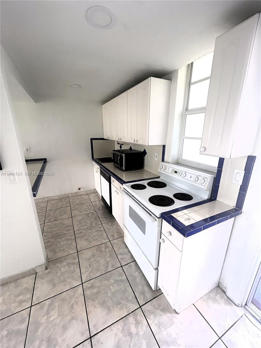 POINT EAST SEC II CONDO - Residential