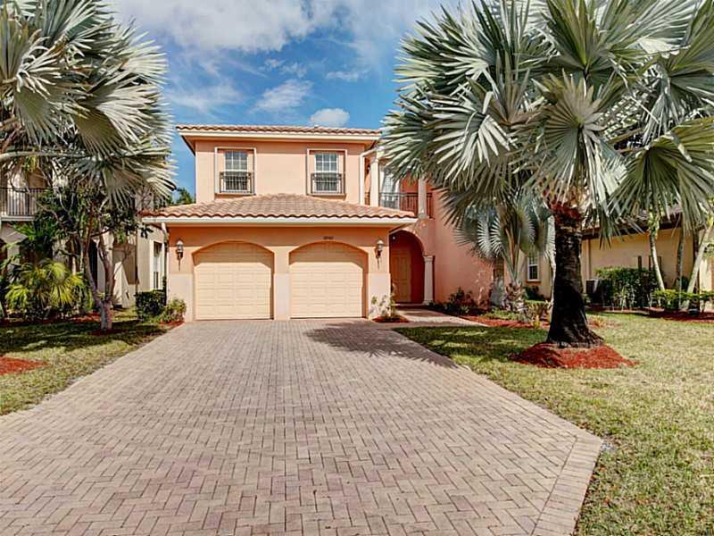 5 BED 4 BATH,POOL& SPA.18X18 TILE IN ALL LVG AREAS,VOLUME 24' CEILINGS IN LVG ROOM,CROWN MOLDING IN ALL LVG AREA'S, WROUGHT IRON STAIR RAIL.GOURMET CHEFS KITCHEN WITH 42" UPPER WOOD CABINETS,GRANITE COUNTER TOPS &BACKSPLASH,DBL DOOR REFRIGERATOR,GLASS TOP STOVE WITH MICROWAVE&ISLAND KITCHEN AREA.M.BATH WITH SEPARATE VANITY SINK AREA'S, FRAMELESS SHOWER ENCLOSURE SEPARATE JACUZZI TUB.MASTER BED WITH COFFERED CEILINGS FRENCH DOORS THAT OPEN TO COVERD BALCONY.ACCORDION SHUTTERS. 40 FOOT SCREENED IN PATIO.