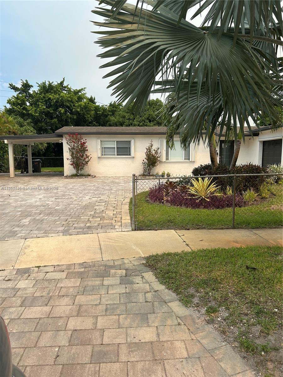 Beautifully maintained 3-bedroom, 2-bathroom, 1 car garage home offering 1,558 sq ft (as per appraisal) of comfortable living space on an incredible 18,000+ sq ft lot. Enjoy a recently resurfaced oversized pool—perfect for relaxing or entertaining.
Step inside to find an open layout boasting an updated kitchen with gas stove and beautiful porcelain and terrazzo floors. The bathrooms have been recently renovated with modern finishes. The home is secured with impact windows and doors throughout, with just three openings protected by accordion shutters, qualifying you for the full insurance discount.
Additional highlights include a large driveway with stylish pavers redone in 2024, built in closets, gas water heater as well as a freshly painted exterior.
This home in move in ready!