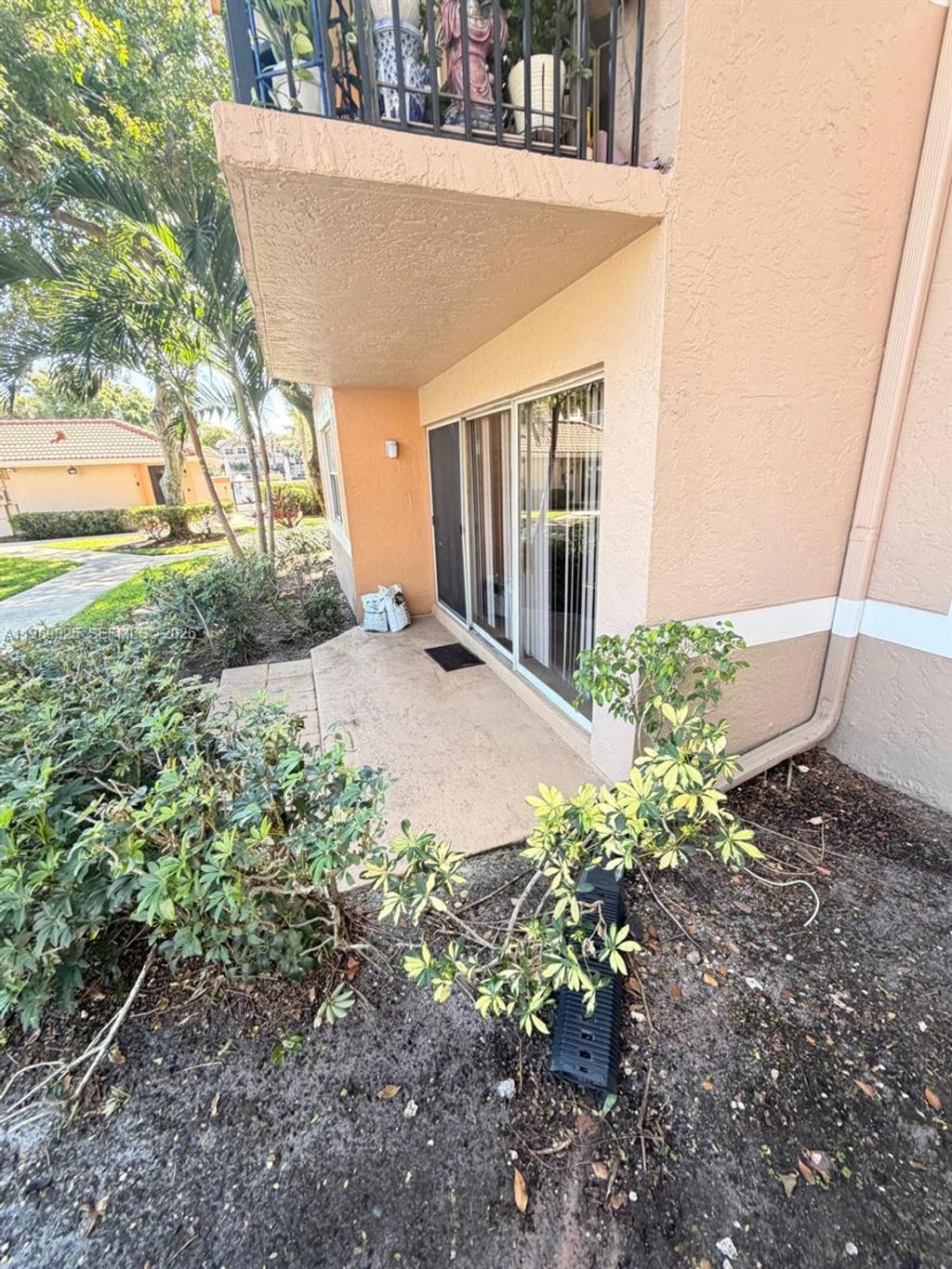 Photo of 8821 Wiles Rd #108, Coral Springs, FL 33067 (MLS # A11989025)
