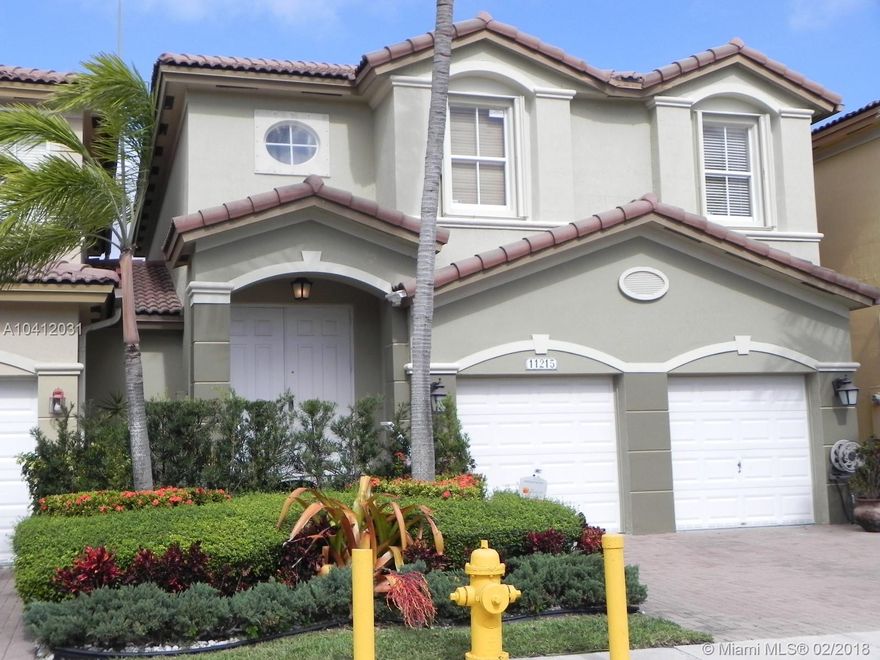 GORGEOUS 4 BEDROOMS, 2 1/2 BATHS,WITH 2 CAR GARAGE IN POLYNESIAN AT ISLANDS AT DORAL, OPEN KITCHEN WITH GRANITE COUNTERTOPS, STAINLESS STEEL APPLIANCES, WOOD FLOORING THROUGHOUT, CUSTOM CLOSETS, HURRICANE SHUTTERS, PATIO AND MORE. CLOSE COMMUNITY WITH POOL, SECURITY, MASTER CLUBHOUSE WITH TENNIS COURTS AND MORE. THE PROPERTY HAS MANY UPGRADES TO ENJOY LIVING. AMENITIES INCLUDE COMMUNITY POOL, CLUBHOUSE, ETC. CLOSE TO MIAMI INTERNATIONAL AIRPORT, SHOPPING MALLS, AND MAJOR HIGHWAYS. A+ SCHOOLS NEARBY. COME AND SEE IT, IT WILL NOT LAST!!!!