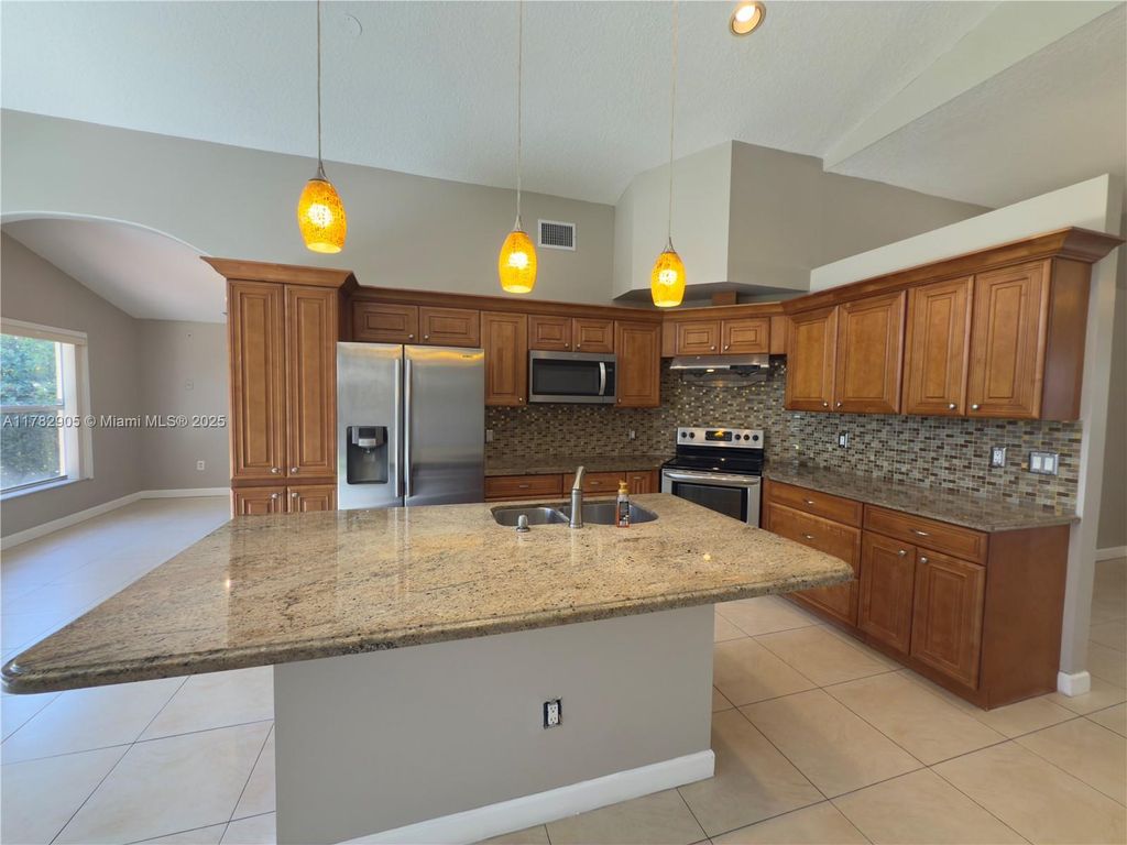 Photo of 5738 NW 48th Dr, Coral Springs, FL 33067 (MLS # A11782905)