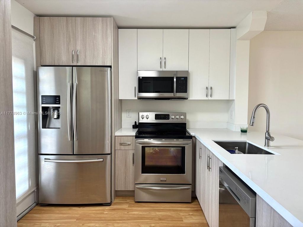 Photo of 205 SE 11th Ter #407, Dania Beach, FL 33004 (MLS # A11778963)