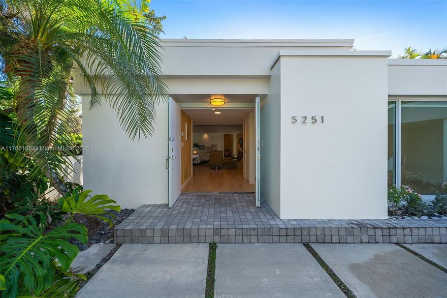 5251 LaGorce is an excellent example of architect Robert Little's vision of the Modern Tropical Home.  The home's L-shaped design exemplifies the South Florida indoor/outdoor lifestyle of yesterday and today with glass doors in every room allowing views and passage to the garden patio and pool.  The vaulted wood ceiling in the living area exudes that Miami Mid-Century Modern nostalgia.  Features of this modern tropical home include an attached 2-car garage, driveway for 3 additional vehicles, completely fenced in backyard, covered patio and recently installed impact windows. This is the perfect canvas for the next owner to design their dream home or to just enjoy the home's existing beauty.