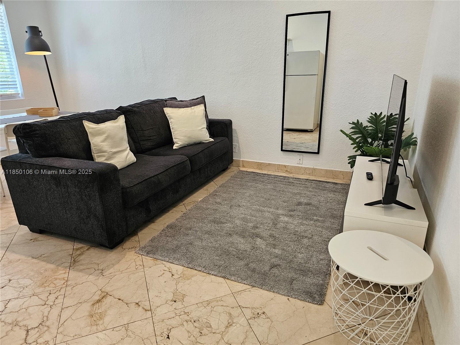 Nice corner unit 1 bedroom furnished. Bathroom with shower and window. Laundry facility on the first floor. Private cabinet with lock in the laundry room for leaving detergent. Just 2 floors condminium. Few steps from the beach. Vacant. Easy to show.
