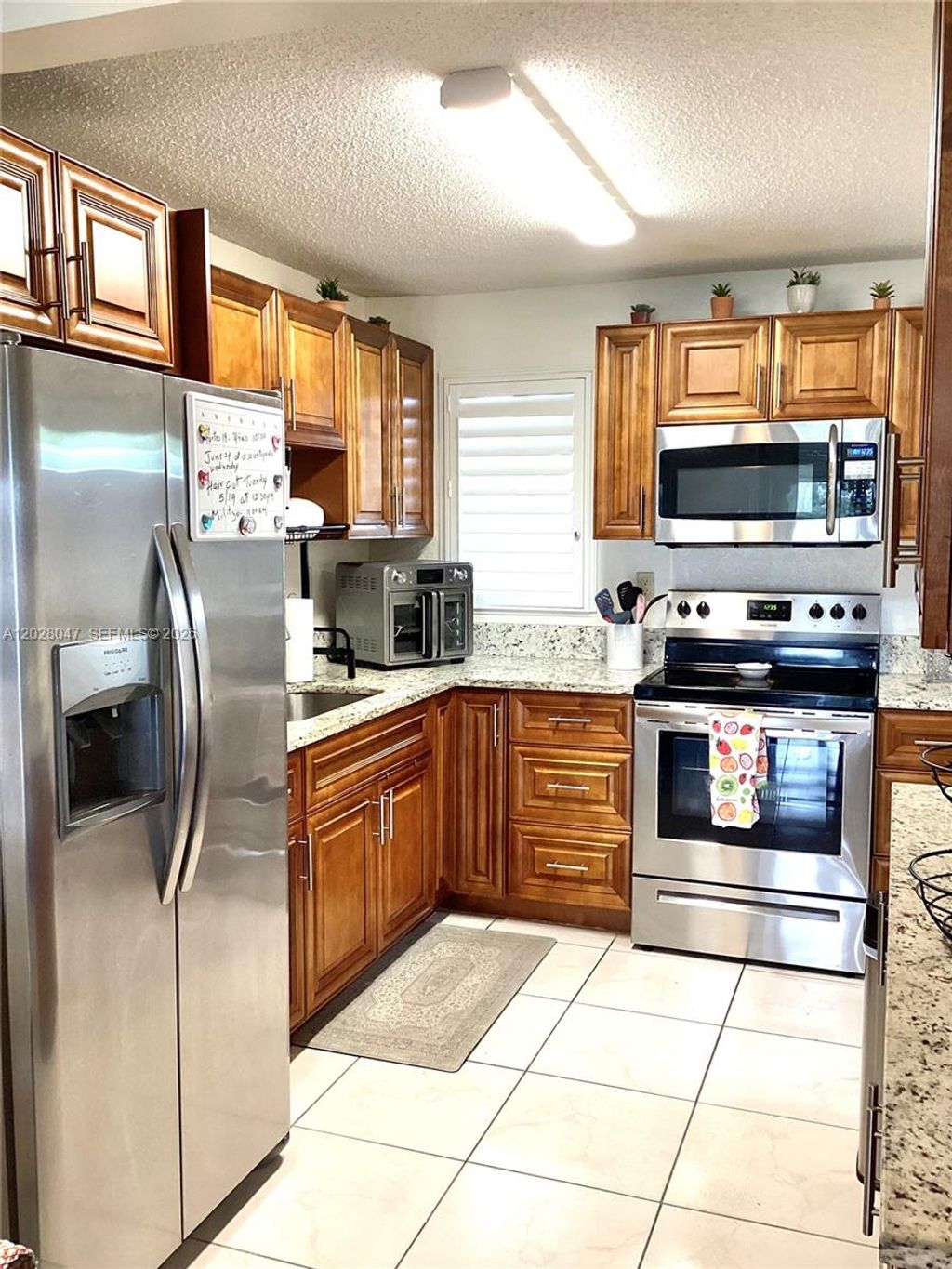 Photo of 8900 Washington Blvd #415, Pembroke Pines, FL 33025 (MLS # A12028047)