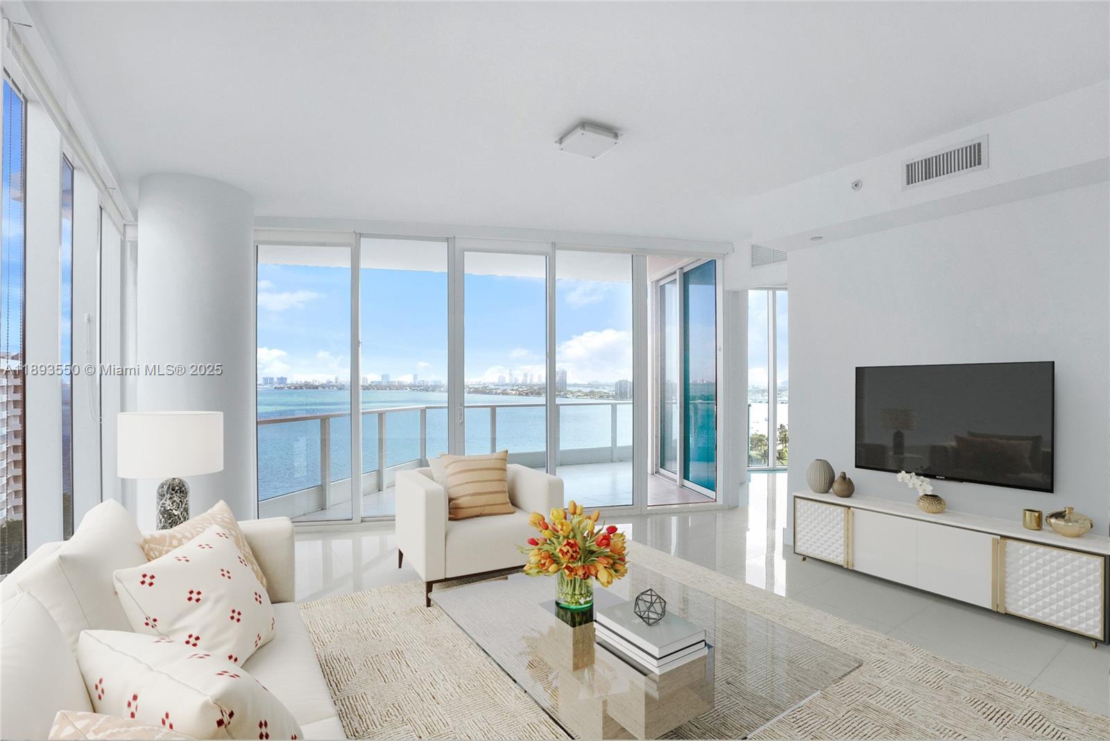 This beautifully designed 2-bedroom, 2.5-bathroom corner home features floor-to-ceiling windows showcasing breathtaking Bay views. The expansive layout includes an oversized balcony, spacious bedrooms with en-suite bathrooms, and a private laundry room. The open living and dining area is ideal for relaxing or entertaining, while a private elevator entrance ensures a seamless arrival experience. Paramount Bay sets the standard for luxury living with its exceptional amenities: sunrise and sunset pools, private cabanas, BBQ areas, a state-of-the-art fitness center, and 24/7 concierge and valet services. Ideally located steps from Margaret Pace Park and just minutes from South Beach, Wynwood, and Brickell, this residence offers the perfect blend of tranquility and vibrant city living.