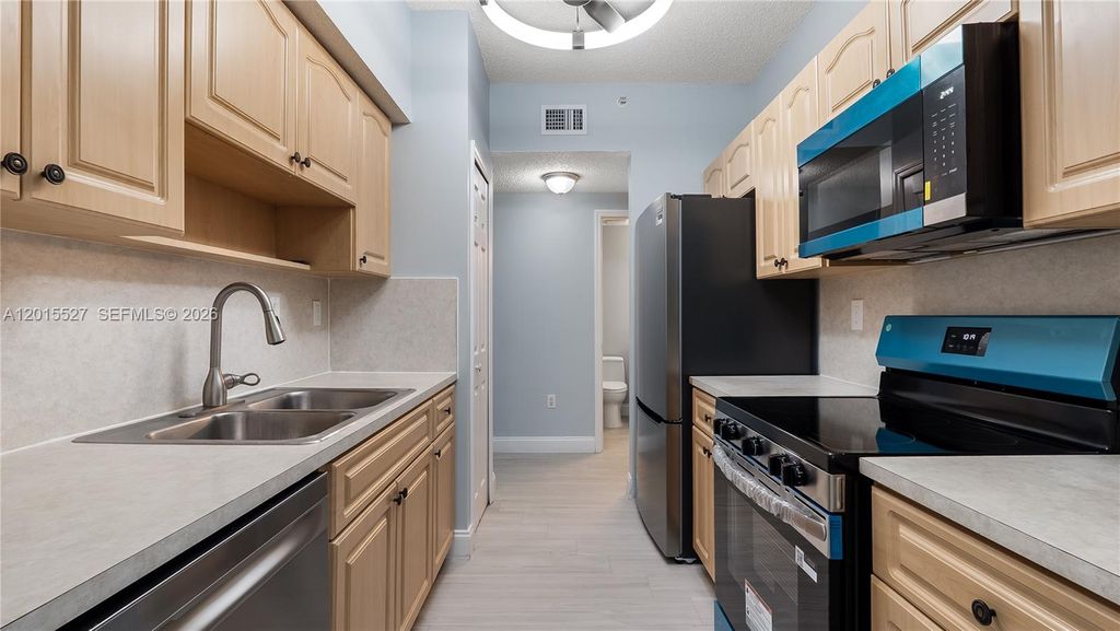 Photo of 7085 Nova Dr #105, Davie, FL 33317 (MLS # A12015527)