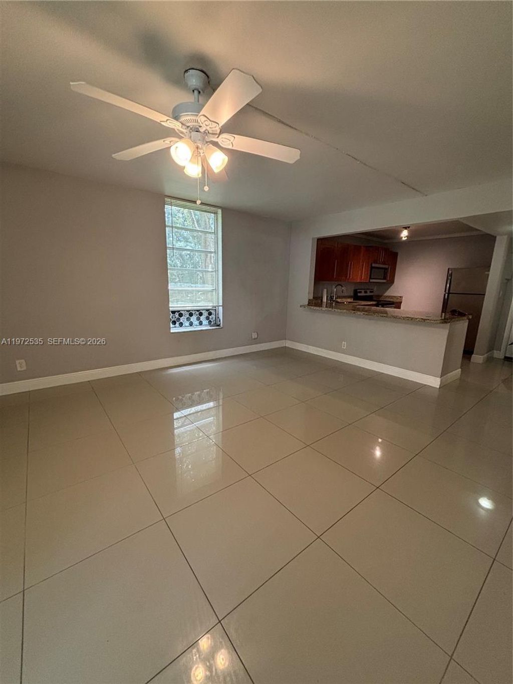 Photo of 400 Commodore Dr #107, Plantation, FL 33325 (MLS # A11972535)