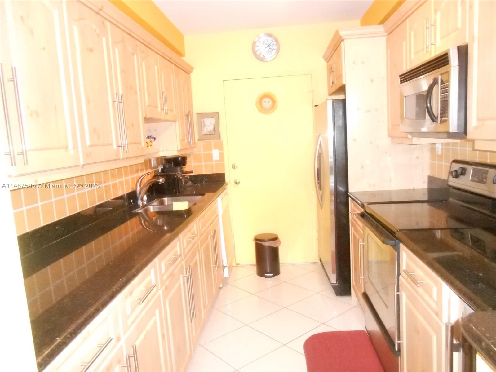 THE CARRIAGE HOUSE CONDO - Residential