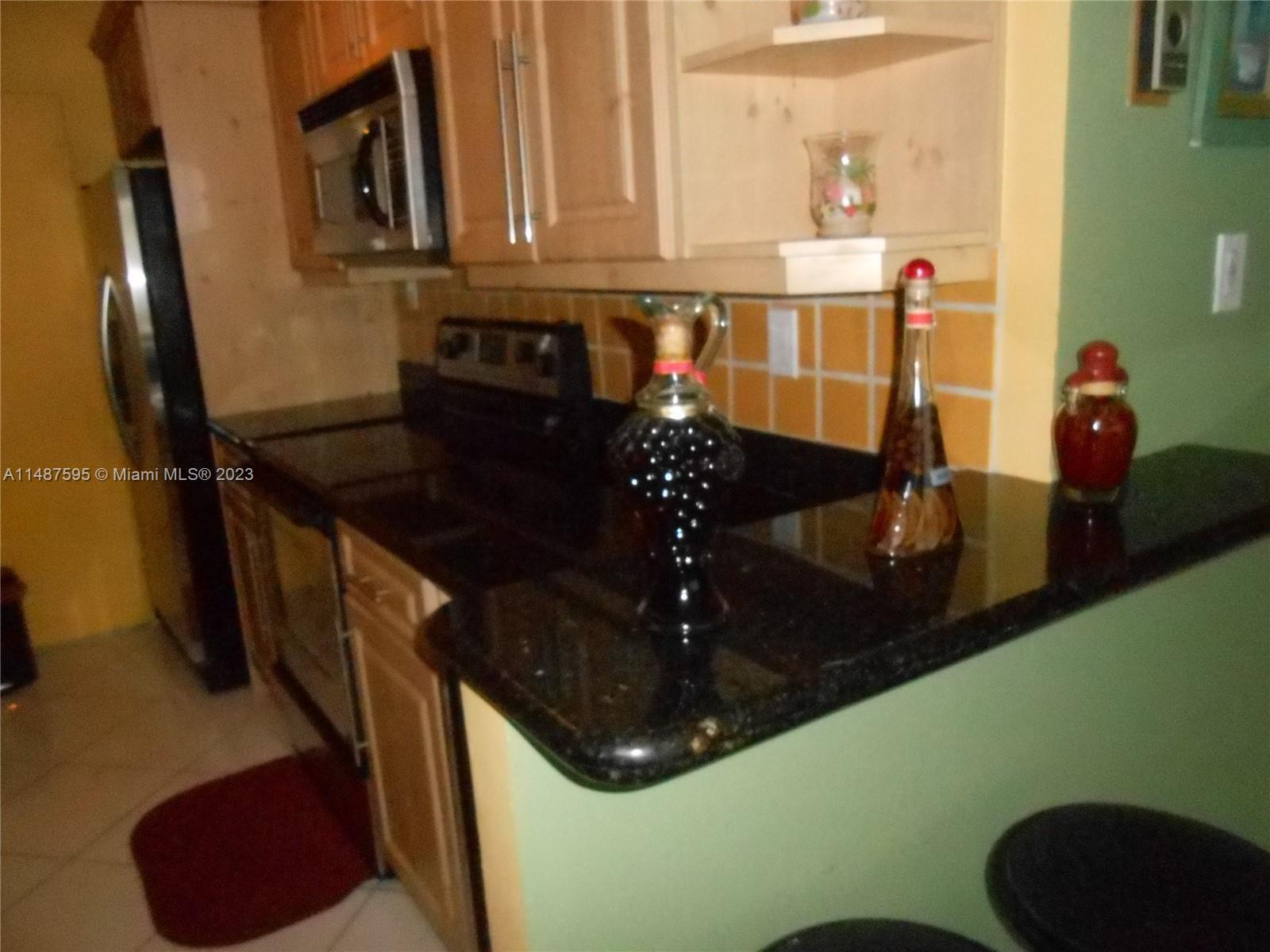 THE CARRIAGE HOUSE CONDO - Residential