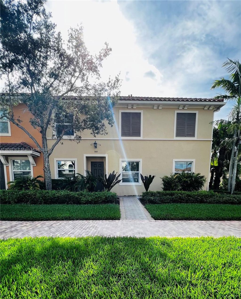 Photo of 3185 NW 126th Ave #3185, Sunrise, FL 33323 (MLS # A11650316)