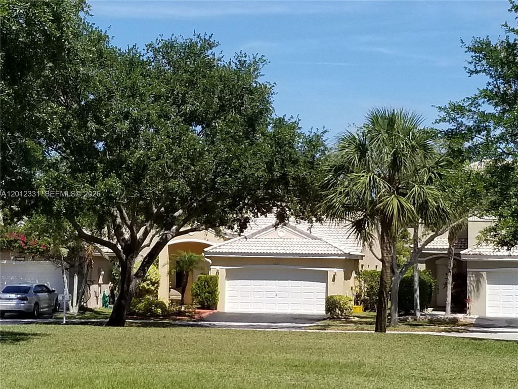 Photo of 1527 Palermo Dr, Weston, FL 33327 (MLS # A12012331)