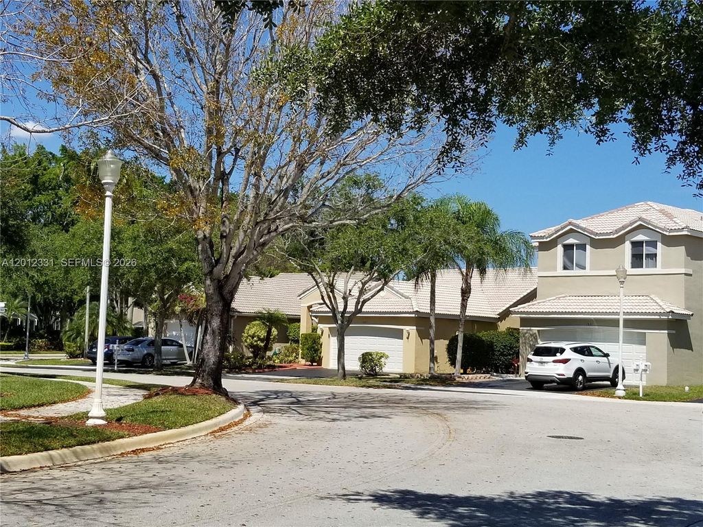 Photo of 1527 Palermo Dr, Weston, FL 33327 (MLS # A12012331)