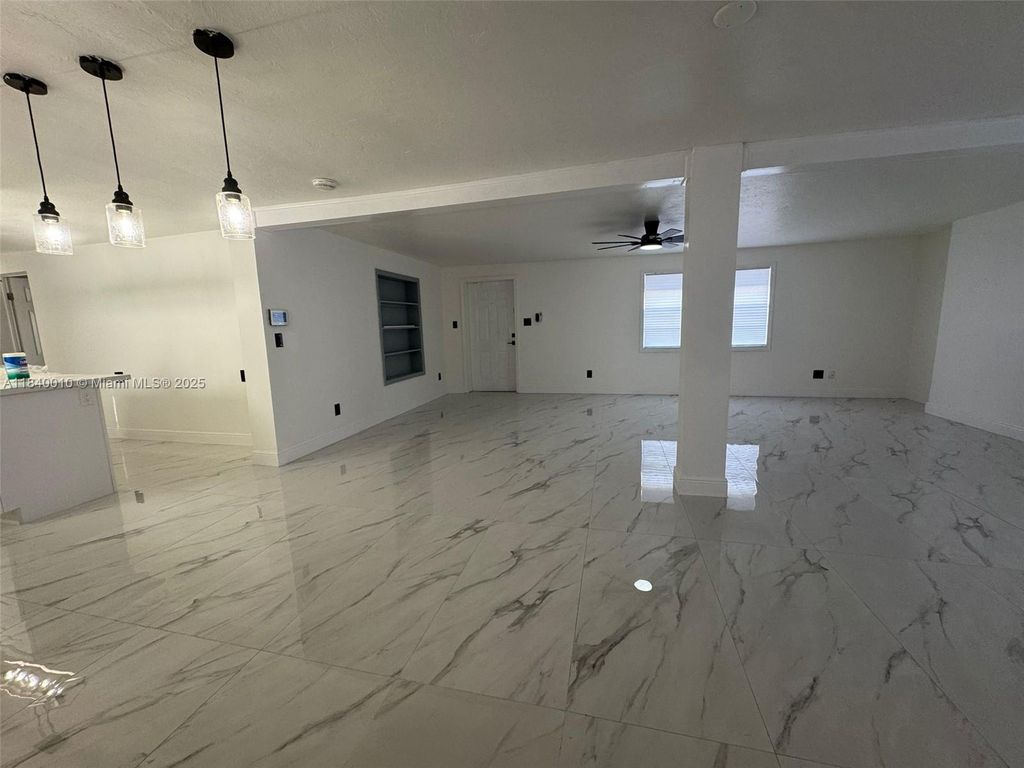 Photo of 1012 SW 25th Ave, Fort Lauderdale, FL 33312 (MLS # A11840010)