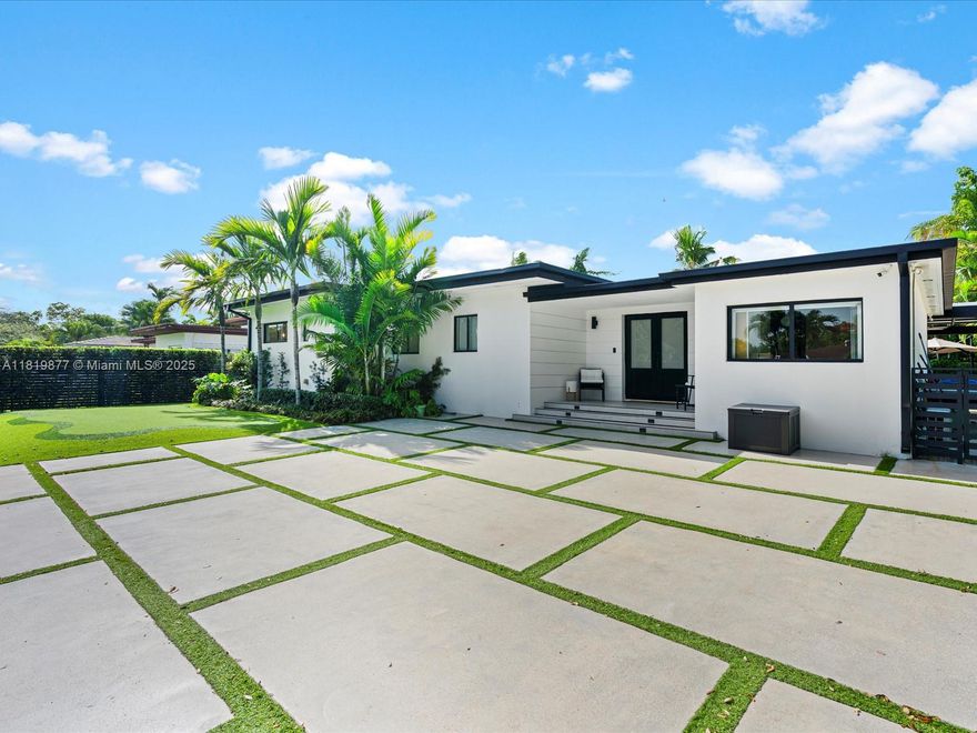 Step into this completely remastered and fully upgraded home,  in the heart of Little Gables, just minutes from the Granada Golf Course, Miracle Mile, and The Plaza. This 4-bed, 3-bath home was thoughtfully designed offering both elegance and modern sophistication. The stunning kitchen features quartz countertops, top-tier appliances, a gas cooktop, and a premium Perlick fridge with built-in nitrogen and CO2 taps—perfect for serving cold brews & beverages. Step outside into your private oasis— where lush landscaping surrounds a stunning, expansive pool and meets the fully equipped summer kitchen. Perfect for grilling and entertaining guests! Additional features include a Savant System, Tesla charger, and Pool Spa. Every corner speaks to quality and relaxation. A true turnkey retreat!