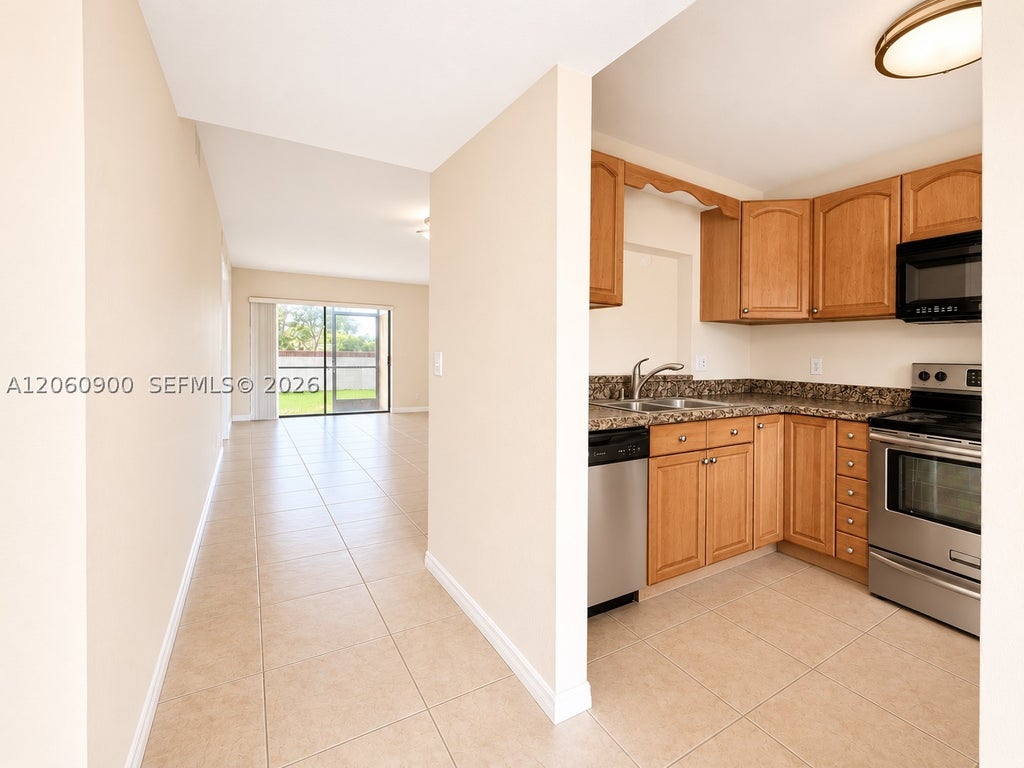 Photo of 6585 Somerset Dr #103, Boca Raton, FL 33433 (MLS # A12060900)