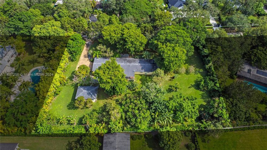 Nestled on a serene, tree-lined side street in the heart of Pinecrest, this one-acre lot with the original 1950's home offers the perfect opportunity to remodel or build your home.  This prime location combines quiet with the benefit of an established neighborhood of stately homes ideal for walking your dogs surrounded by mature landscaping and trees.  Enjoy the beauty of Pinecrest's natural setting, with plenty of space to design a custom estate, pool, garden. Conveniently located near top schools, parks, and shopping, this property provides a rare opportunity to build a private sanctuary in one of the area's most desirable communities.
