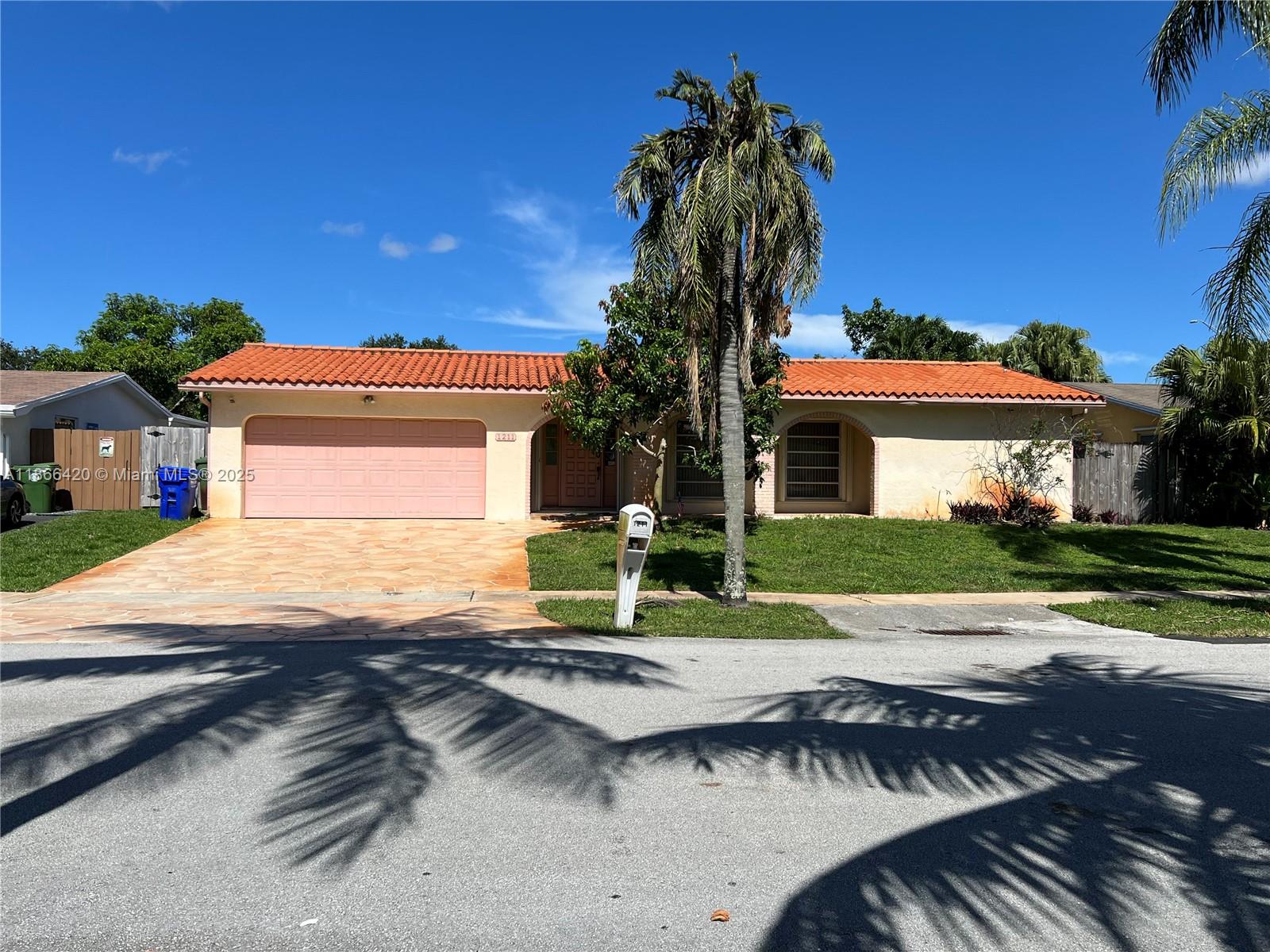 Great opportunity for first time home buyers in the heart of Pembroke Pines! Large 4 Bedroom 2 Bath home with great potential. Split floor plan, hurricane shutters, Mexican tile, new flat roof, new water heater/AC and 2 car garage. Mature mango tree, sun filled home, large pool and great outdoor space for gatherings.
