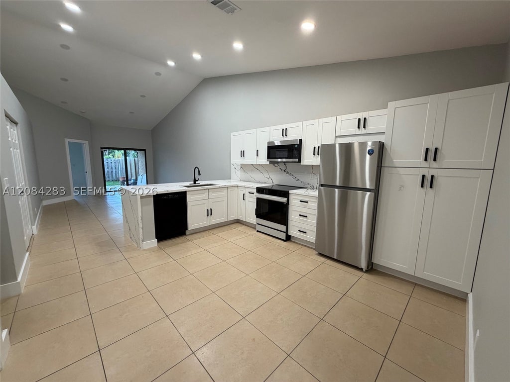 Photo of 11085 NW 38th Pl, Sunrise, FL 33351 (MLS # A12084283)