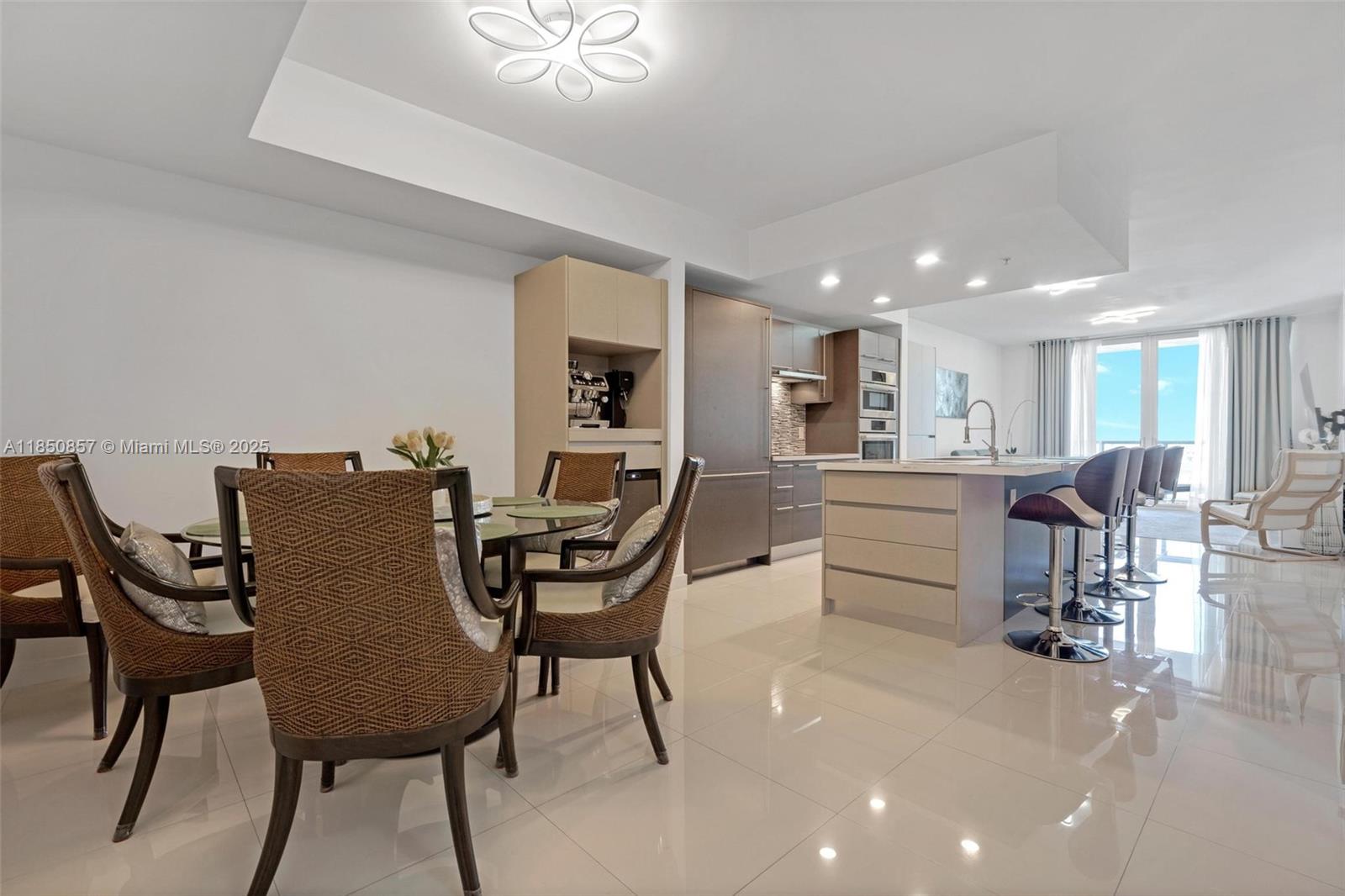 Explore luxury living in this fully furnished rental condo in Midtown Doral. Enjoy the convenience of a fully
furnished space, offering both comfort and style. This 1-bed, 2-full-bath residence boasts a sophisticated design
with high-end finishes throughout. The modern kitchen has a built-in refrigerator and dishwasher with Italian
cabinets—all Bosch Appliances. Modern doors and high ceilings give the unit a lot of spaciousness and light. Shops
on the ground floor of the buildings include restaurants, dentists, dog grooming, beauty salons, pilates and much
more.Rent includes water and internet. An additional parking space can be acquired for an additional $150 per
month. HOA REQUIRES $500 SECURITY DEPOSIT