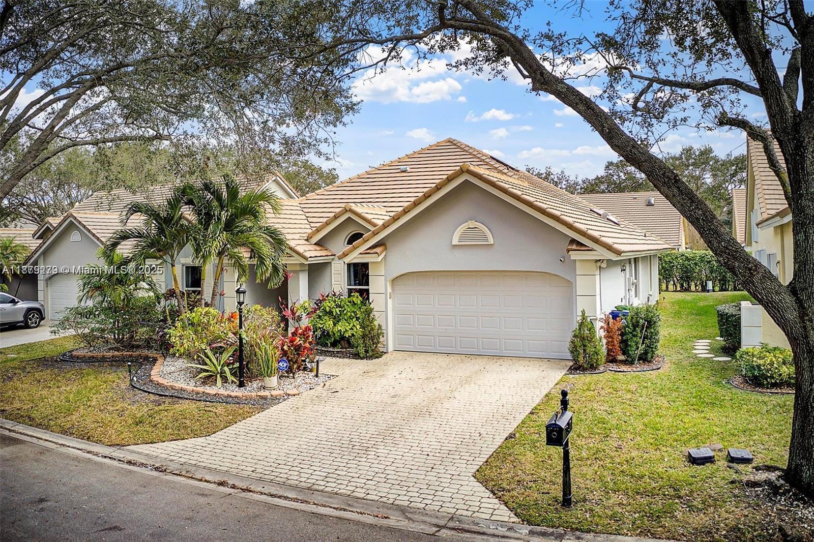 Do not be late! Beautiful completely updated home in prestigious community. New tile flooring, no carpet, new kitchen cabinets with quartz counter tops and new appliances, updated bathrooms, Impact windows, vaulted ceilings and skylights that provide natural light. Private backyard and screened patio. Charging for Tesla.There’s also an office space, a family room, and sliding doors leading to an exercise room. Trace offers pool, golf course, tennis courts. Security and privacy community, with 24 hour guard gated entrance