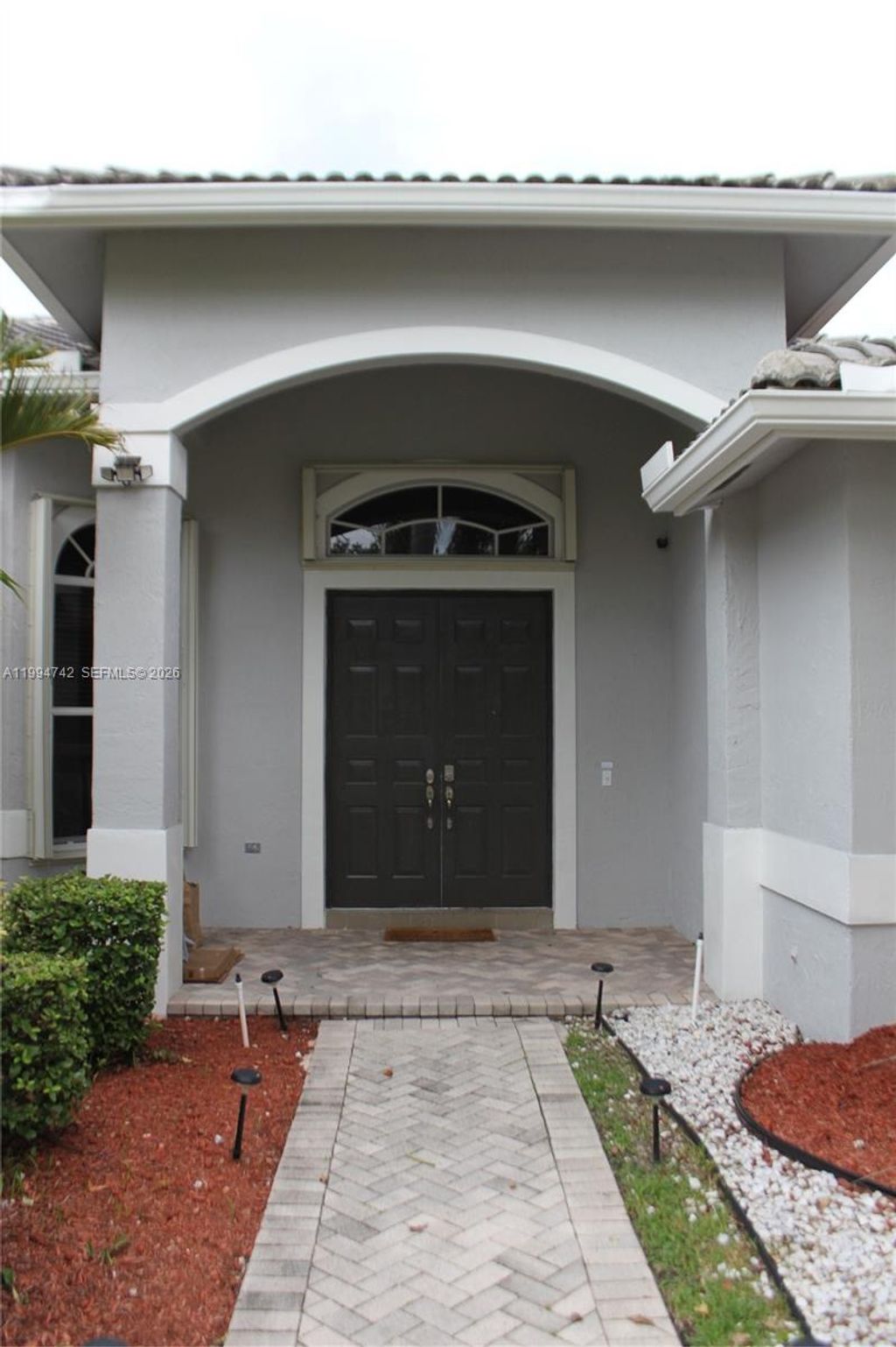 Photo of 870 Reflection Ln #870, Weston, FL 33327 (MLS # A11994742)