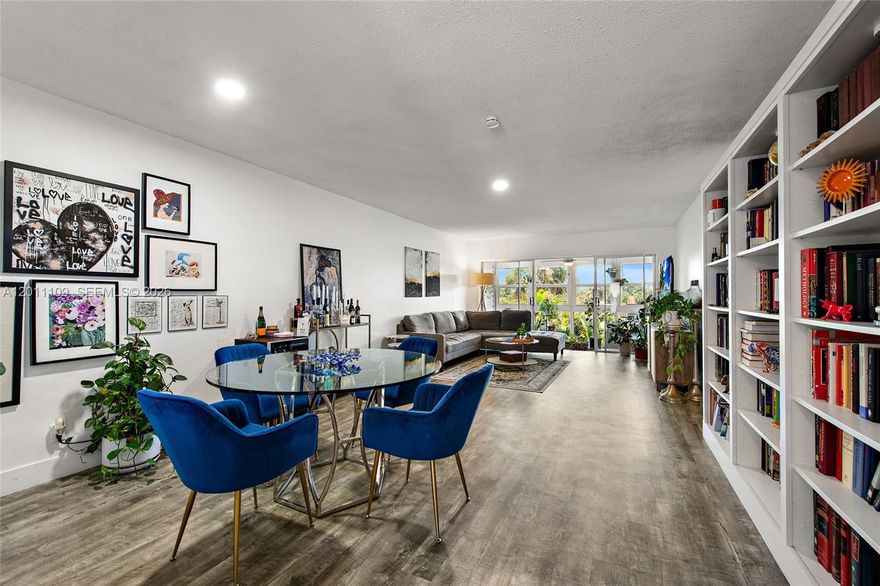 Own at the Rio Nuevo, live in this tastefully fully remodeled 2 bed-2 bath condo on the top floor. Enjoy serene canal and garden views from the enclosed balcony, endless sunrises and sunsets. Updated kitchen, newer floors throughout, remodeled bathrooms, walk-in closet in the primary bedroom, built-ins in the living area, impact windows. Gated community, assigned covered parking, lots of guest parking spaces, central to all your needs - minutes from the i95 highway, FLL airport, downtown Fort Lauderdale, and the beach. Amenities include heated pool, BBQ, clubhouse, shuffleboard, on site laundry, courtyard, extra storage per unit, elevator. Book your visit today!