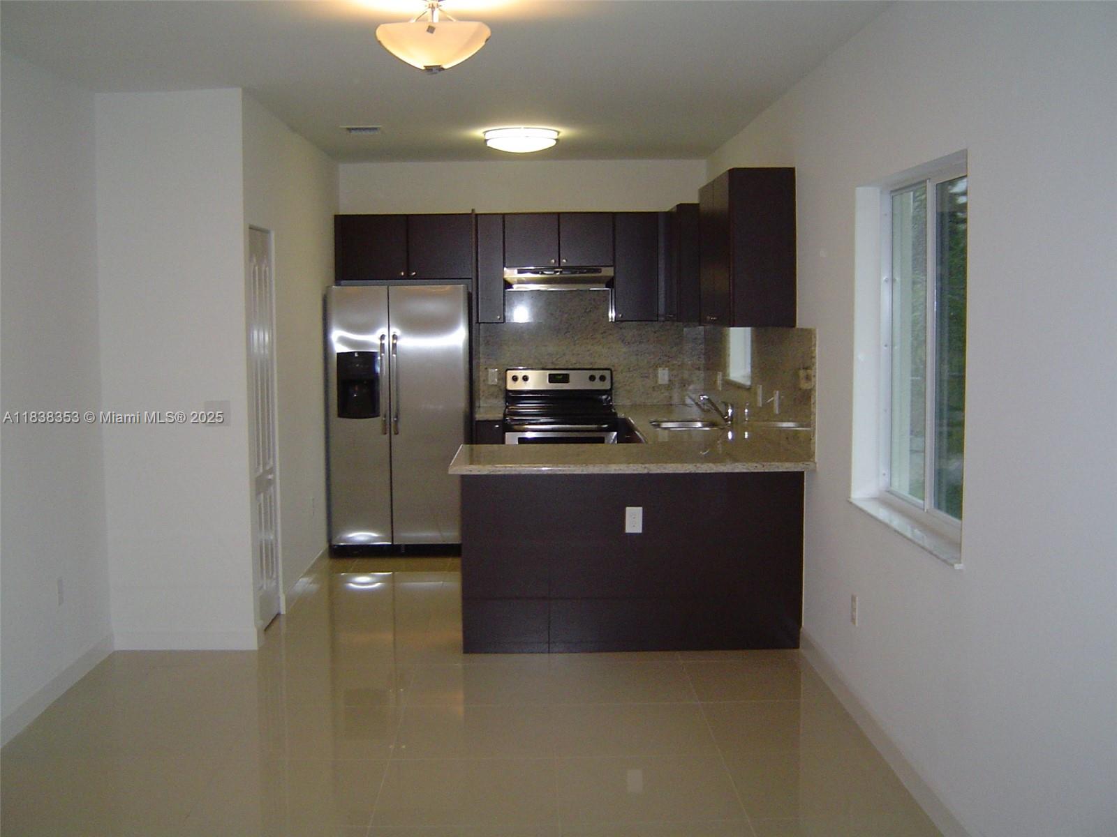 Beautiful duplex across the street from St Peter St. Paul church in the Roads big yard, covered patio, 2 parking spaces, 9 ft ceilings, impact windows, window treatments, built-in closets, porcelain floors, washer and dryer, granite tops, spacious rooms, linen closet. NO PETS ALLOWED