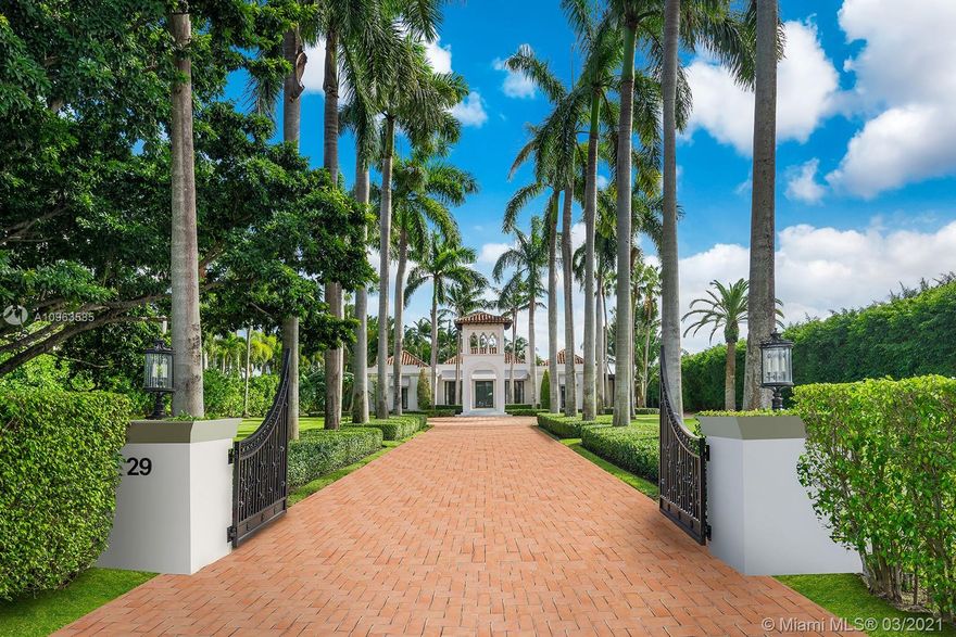 Step Inside With Me! A classic Regency on the ‘Gold Coast’ of Indian Creek Village is 1 of only 36 estates on the 300 acre island where privacy is the utmost luxury. The mid-century modern interiors parallel the aesthetic of a minimalist Manhattan Penthouse in this effortlessly designed open plan. Complimented by its resort grounds, a lyrical view to the Southern waters of Biscayne Bay, and enhanced by the dual exposure to the golf fairway, this 1.24 acre property offers 145 linear feet of yacht-friendly frontage.  A perfectly executed landscape plan leaves room for what may be - tennis, pool house. With an infrared security system coming soon, its own police patrol both by land and sea, and an impenetrable main entry, 29 Indian Creek Island is the gem of America’s Billionaire Bunker.
