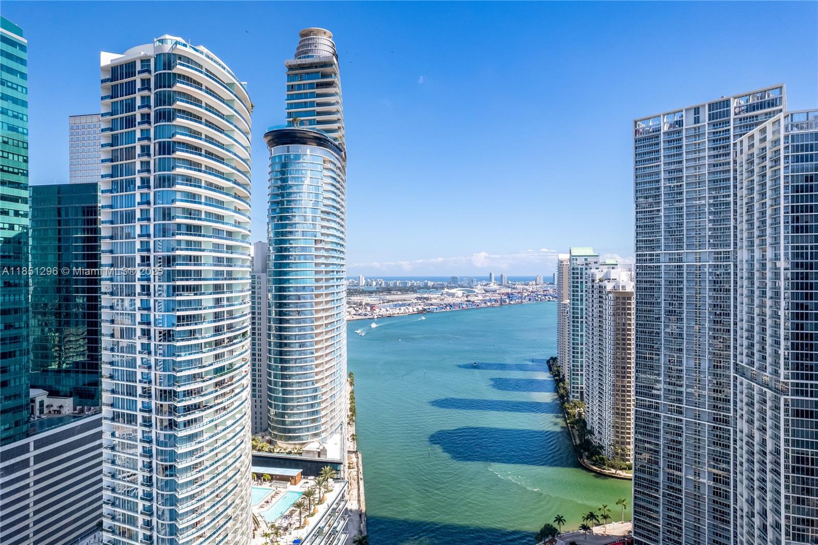 Breathtaking views of Biscayne Bay, Port of Miami & Miami River from this coveted Line 07 corner unit at Epic Residences! This spacious 2BD/2.5BA features oversized ceramic floors, floor-to-ceiling impact glass, & an Italian Snaidero kitchen with Giada marble countertops, dark oak cabinetry, & stainless accents. The split floor plan offers privacy & spa-like bathrooms with luxury finishes throughout. Enjoy 5-star amenities including Exhale Spa, fitness center, rooftop pool, sauna, cabanas, concierge, valet, kids’ play area, & on-site dining at Zuma & Area 31. Prime Downtown Miami location near Brickell, Whole Foods, Bayfront Park, & the Riverwalk. This residence blends luxury, location, & lifestyle—ideal for buyers seeking elegance & convenience. Move-in ready & priced to sell!