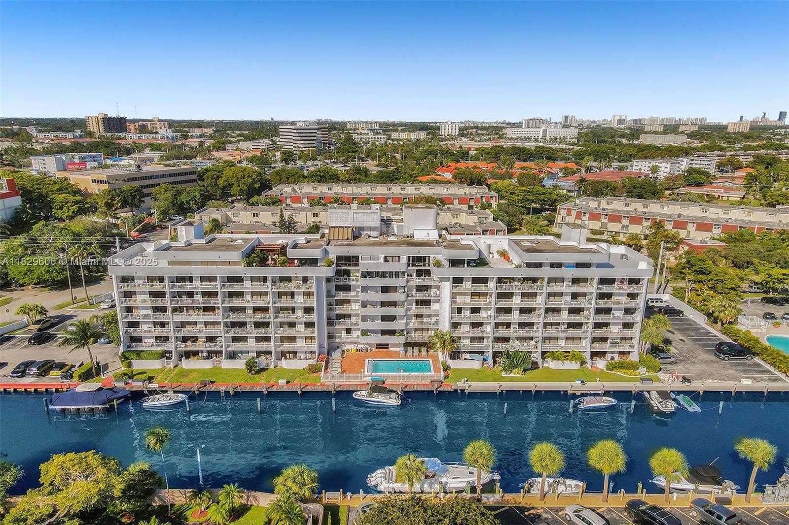Spacious apartment east of Biscayne Boulevard with floor-to-ceiling sliding doors offering stunning canal views and abundant natural light. Features a large walk-in closet that can double as a workspace plus a second closet. Located in an intimate six-story building with a pool, gym, sauna, social area, and a dock with direct bay and ocean access available for rent. The unit includes a private washer and dryer, with communal laundry on each floor. Central air conditioning, water, basic cable, and security cameras are included. Additional storage on the floor and visitor parking completes this ideal waterfront home. Minutes from universities, beaches, shops, and restaurants, offering the best of Miami living.