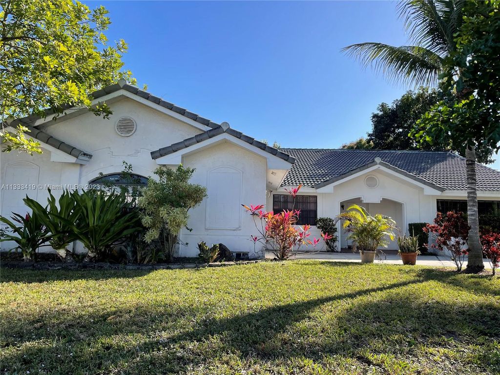 Photo of 6310 Olde Moat Way, Davie, FL 33331 (MLS # A11333419)