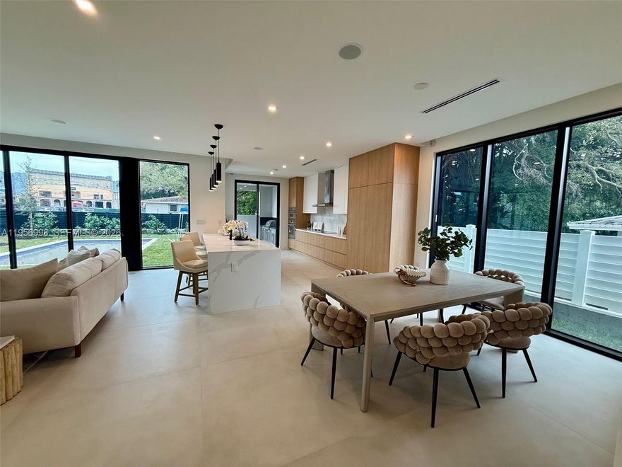 Experience contemporary elegance in this brand-new, 4,016 sq. ft. masterpiece. This 4BR/3.5BA high ceiling home features a light-filled, open-concept design with floor-to-ceiling garden views from every room. The ultimate indoor-outdoor lifestyle awaits with expansive balconies, a private pool, and a professional summer kitchen. The primary suite offers a massive private terrace, while the entire home is pre-wired for full automation with integrated sound and security. Perfectly located just steps from Coco Walk, elite schools, and world-class dining. Your sophisticated Grove sanctuary is ready.