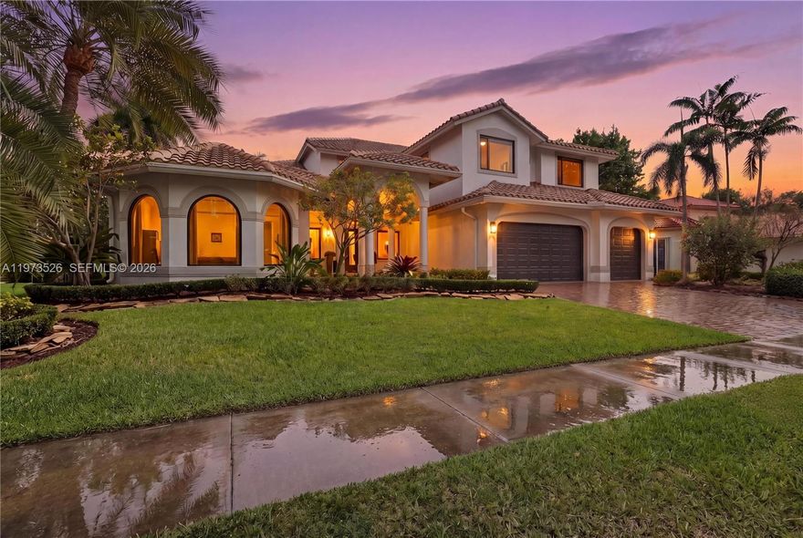 Extensively renovated with no detail overlooked, this move-in ready home blends modern luxury with everyday comfort. Located in the gated Weston Hills Country Club on the 5th hole of The Players Course, it offers sweeping golf views & a tranquil setting. A screened pool & spa patio create a private outdoor retreat ideal for relaxing or entertaining. Major upgrades include a new roof, full impact windows, doors, & garage doors, 3 new AC units w/ new air handlers, new pool pump, new pool & spa heater, & full pool automation. The home has been freshly painted inside & out w/ new flooring & baseboards throughout. The redesigned gourmet kitchen features over $50k in premium Sub-Zero, Wolf & Cove appliances, a Sharp microwave drawer, quartzite counters & backsplash, a 123” x 59” island, ceiling-height cabinetry, Kessebohmer pantry pullouts & a 60” Rachiele workstation sink w/ dual Waterstone faucets. Interior enhancements include glass stair railing, new half bath, frameless shower doors, chrome hardware, new lighting, switches, outlets, smoke detectors & 9 ceiling fans. Smart motorized blinds & quiet garage door motors add convenience. New laundry room offers dual washers & dryers, custom cabinetry & a water bottle filling station. The primary suite includes renovated his-and-her closets w/ extra storage under the stairs. Outdoor updates include a fully rescreened enclosure, new screen doors & 2 outdoor fans. A rare opportunity where every major improvement is already complete.