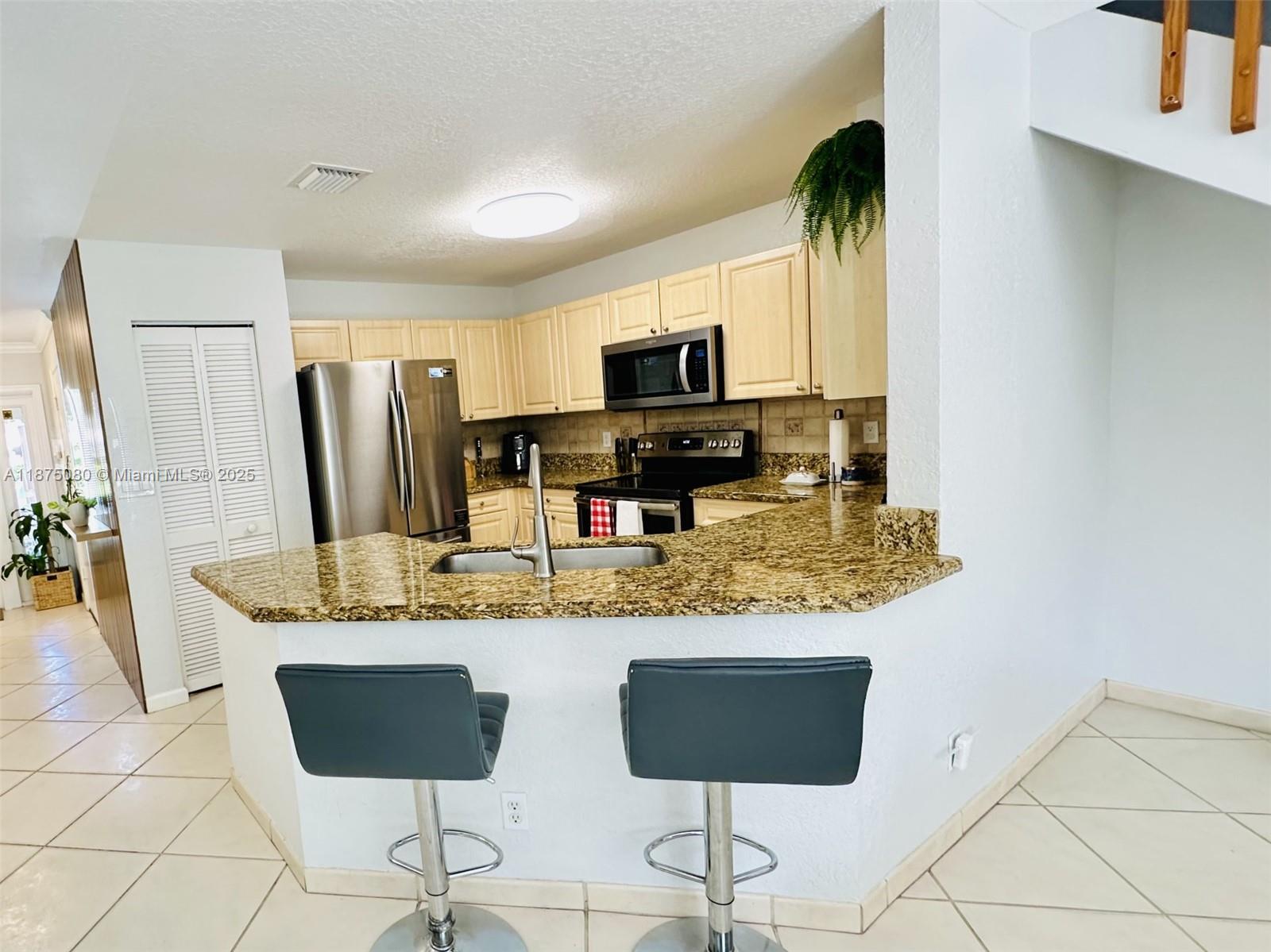 CORAL SPRINGS VILLAGE GRE - Residential