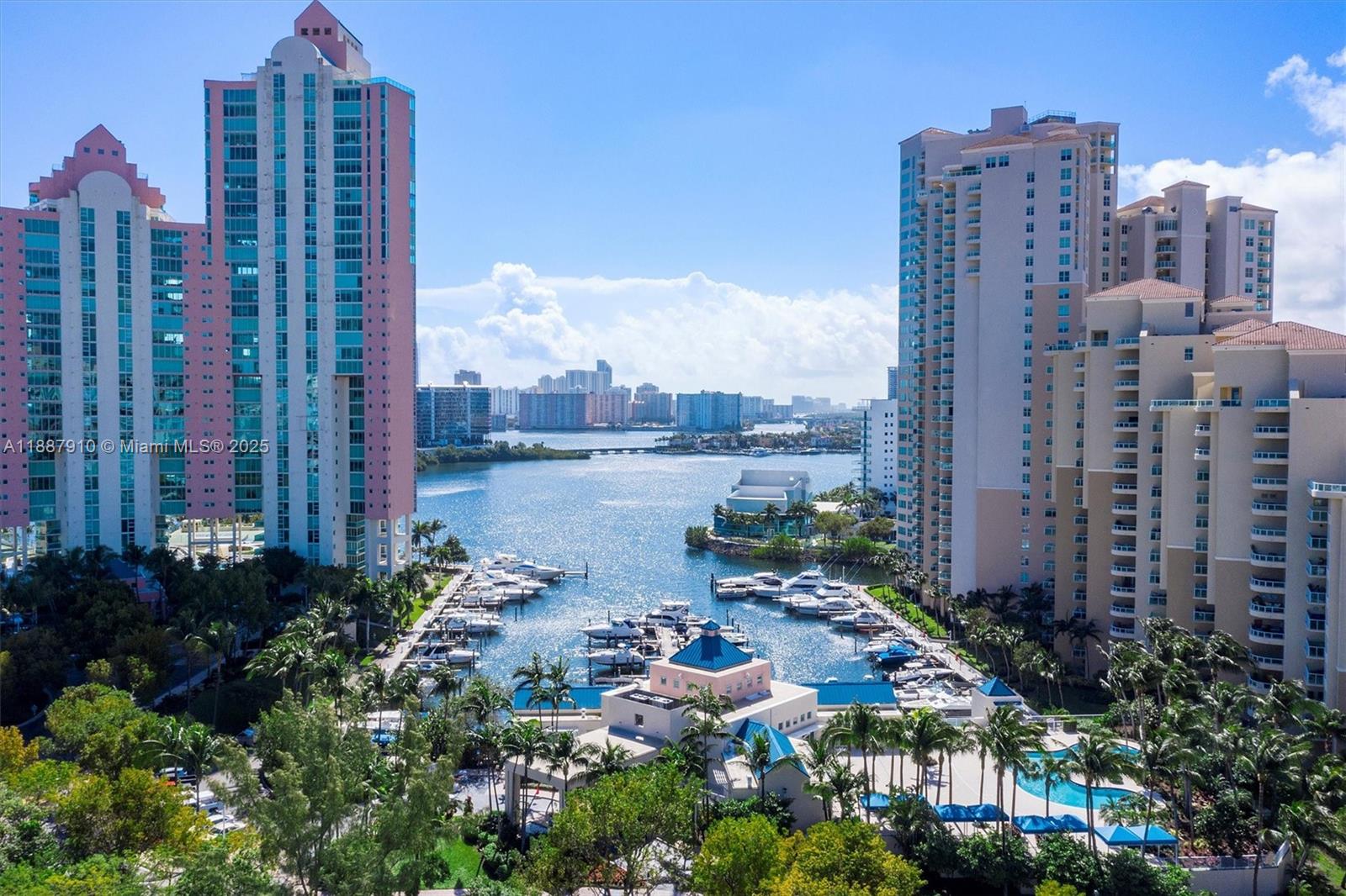 Stunning 2-story corner penthouse with panoramic views of the ocean, Intracoastal & Sunny Isles skyline. Over 2,497 SF interior plus 1,000 SF terrace for outdoor living. Features 12 ft ceilings, wood & porcelain floors, open kitchen, walk-in closets, laundry room, and large storage. Exclusive gated community with marina, walking paths, spa, gym, 2 pools, 4 tennis courts, concierge, valet & 24-hr security. Includes 2 garage spaces. Prime Aventura location.