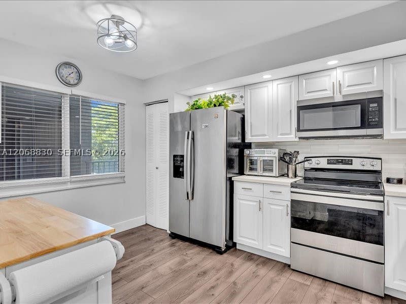 Photo of 12500 SW 5th Ct #208M, Pembroke Pines, FL 33027 (MLS # A12068830)