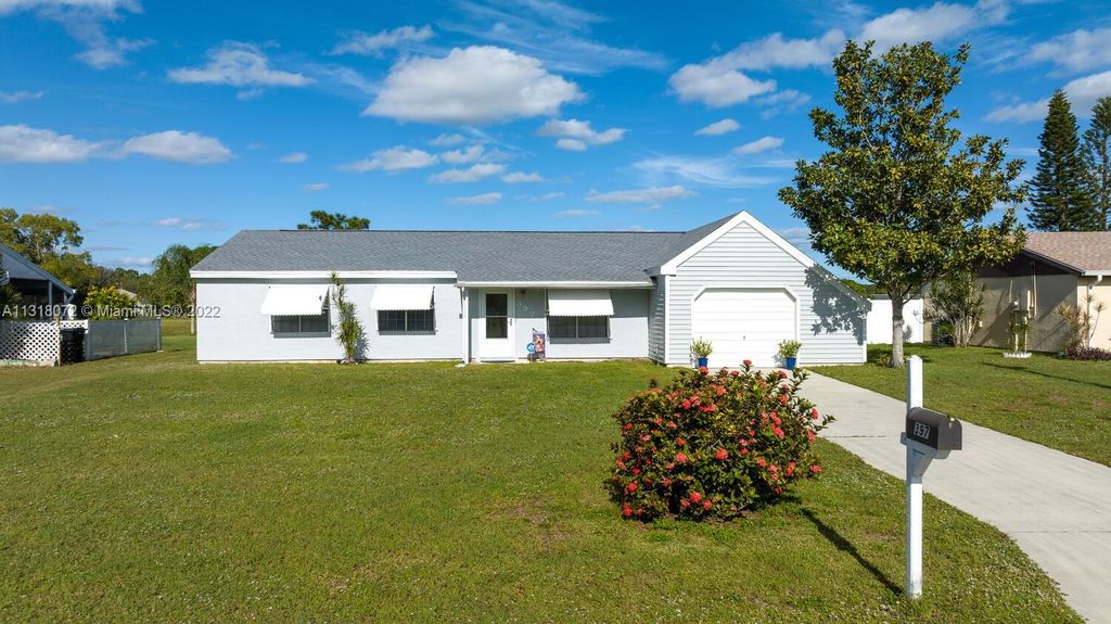 Photo of 397 SW Belmont Cir, Port Saint Lucie, FL 34953 (MLS # A11318072)
