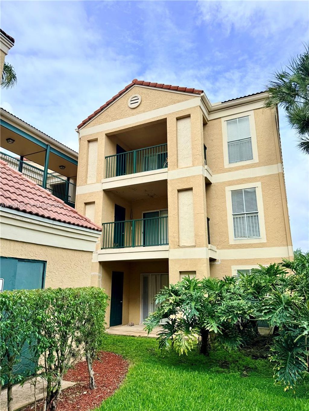 Photo of 733 Riverside Dr #1215, Coral Springs, FL 33071 (MLS # A11994795)