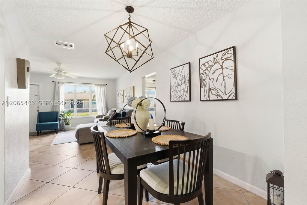 Photo of 4916 NW 55th Ct, Tamarac, FL 33319 (MLS # A12065448)