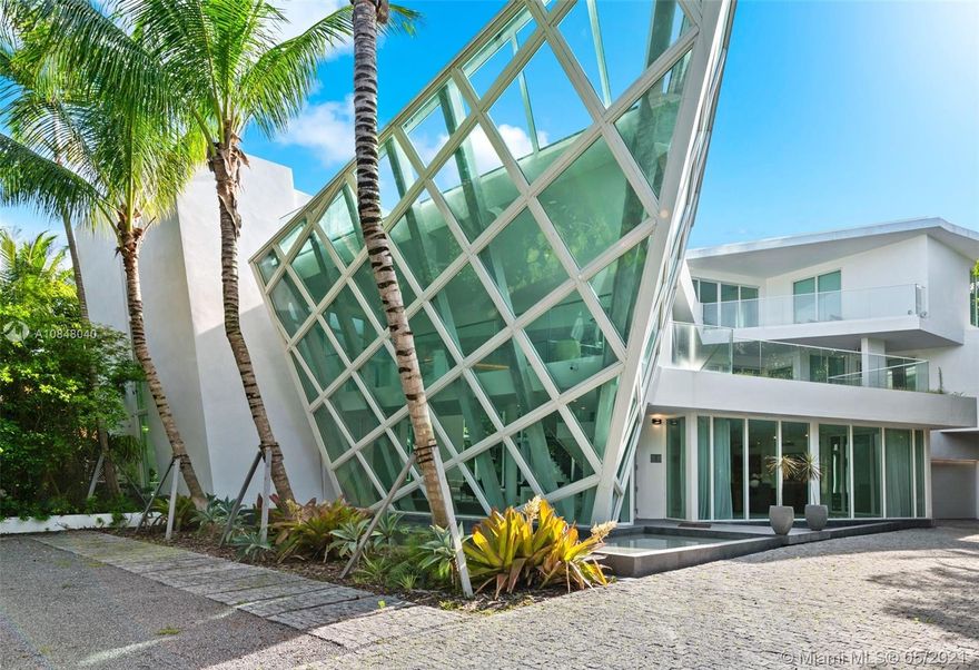 Exquisite Golden Beach Luxury Home, Historically referred to as the Arc. This 9000 sq.ft. Architectural Jewel is a streamline beauty, offering high ceiling contemporary grandeur, with its own private elevator. Alternatively you can climb the state of the art stairway, that leads you to a spectacular roof deck. The unique property also offers lavish walk in closet, Palatial bathrooms and Italian Designer Kitchen. Make an entrance where ever you walk in this 6 bedroom 8 bathroom internationally recognized home. Seller financing available.