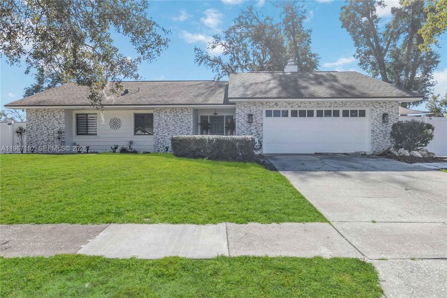 Completely remodeled within the last two years, this beautifully updated home in the highly sought-after Magnolia Village subdivision blends modern comfort with timeless charm. An open floor plan welcomes you in, highlighted by luxury vinyl flooring, recessed lighting throughout, and a cozy wood-burning fireplace that anchors the main living space.
The heart of the home is the stylish kitchen, featuring stainless steel appliances and a large quartz island with built-in storage—perfect for everyday living and casual entertaining alike. The primary suite offers a serene retreat with a double-vanity bathroom, while the guest bedroom includes a thoughtfully designed closet reading nook, adding both function and character.
A sunroom has been converted into a dedicated home gym, creating flexible extra space, while the screened lanai extends your living area outdoors. The large backyard is ideal for relaxing or hosting, complete with bistro lighting, an above-ground pool, and a storage shed for added convenience.
The converted garage serves as private in-law quarters with its own entrance, laundry, and fenced outdoor area—ideal for multigenerational living or guests. Additional upgrades include a new AC system and a roof replaced in 2010.
Located within walking distance to Lake Gandy and offering easy access to SR-414, SR-429, I-4, and Downtown Orlando, this move-in-ready home delivers comfort, versatility, and an exceptional location.