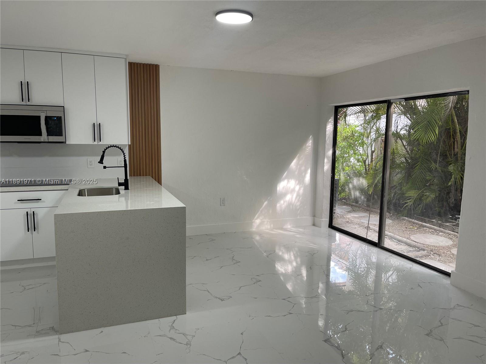 SEA GRAPE TOWN HOMES - Residential Lease