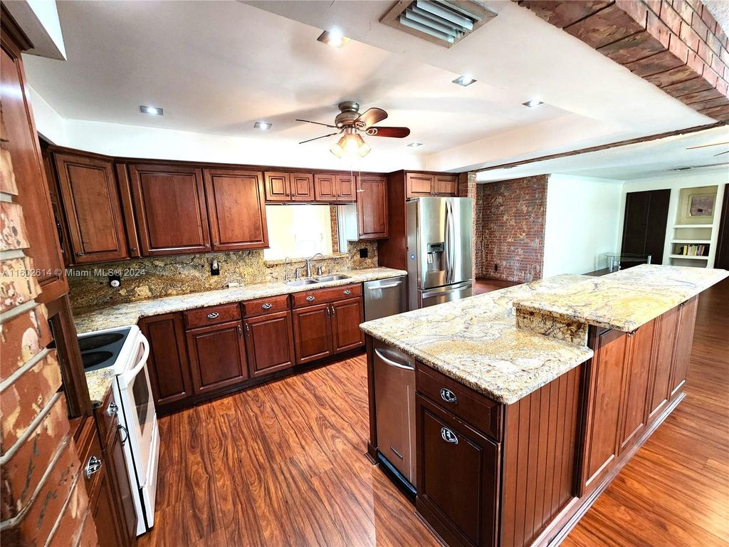 Photo of 251 SW 61st Ave, Plantation, FL 33317 (MLS # A11602614)
