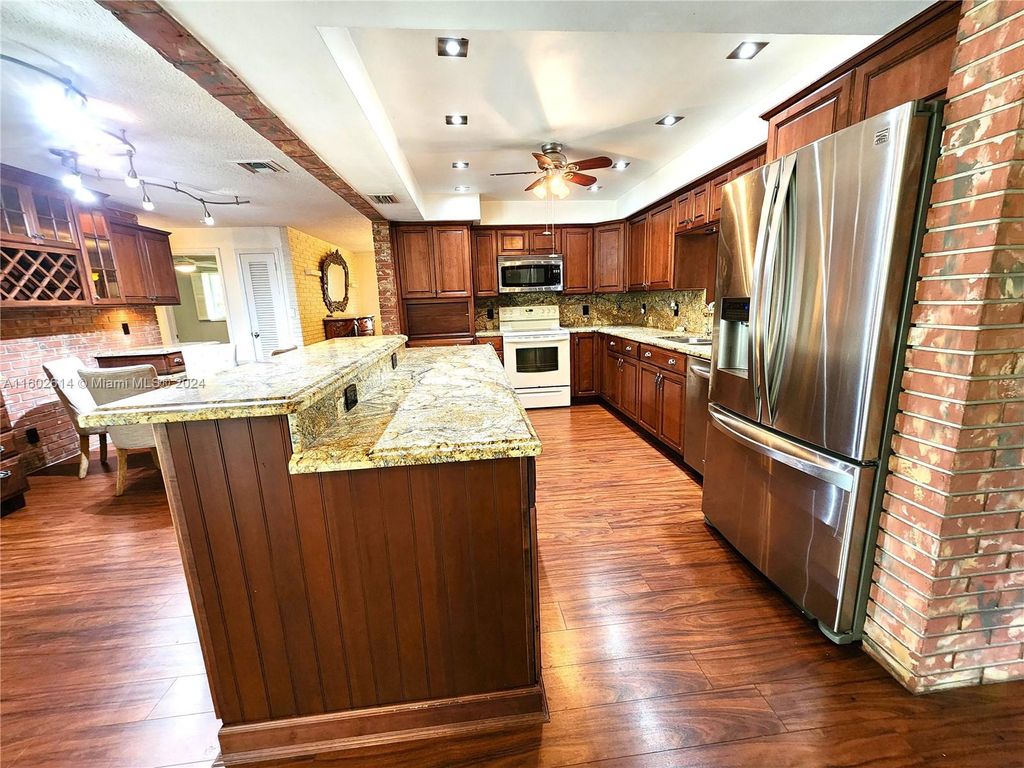 Photo of 251 SW 61st Ave, Plantation, FL 33317 (MLS # A11602614)