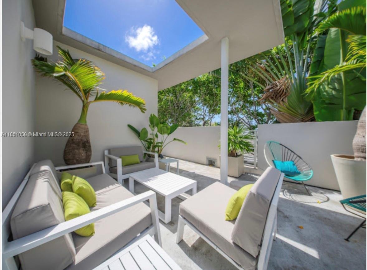 Exceptional Furnished Townhouse in South Beach with Private Rooftop Terrace and covered parking on one of South Beach's most beautiful tree lined streets Meridian Ave. Great South Florida lifestyle. Italian kitchen & bathrooms, quartz counters, porcelain tile and hardwood flooring, impact windows & doors and complete home automation. Complex is gated and located very close to shopping , beaches and South of Fifth neighborhood ! Ready to move in