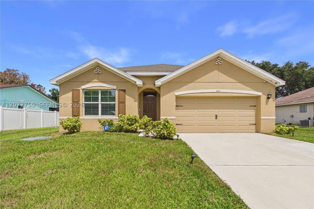 Photo of 301 SE Volkerts Ter, Port St Lucie, FL 34983 (MLS # A12072750)