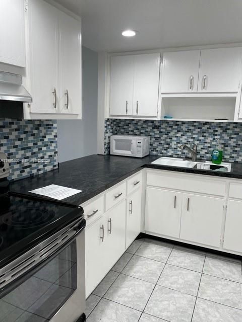 Photo of 1351 NE Miami Gardens Dr #911E, Miami, FL 33179 (MLS # A11950400)